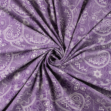 Purple fabric with white paisley pattern, rolled up