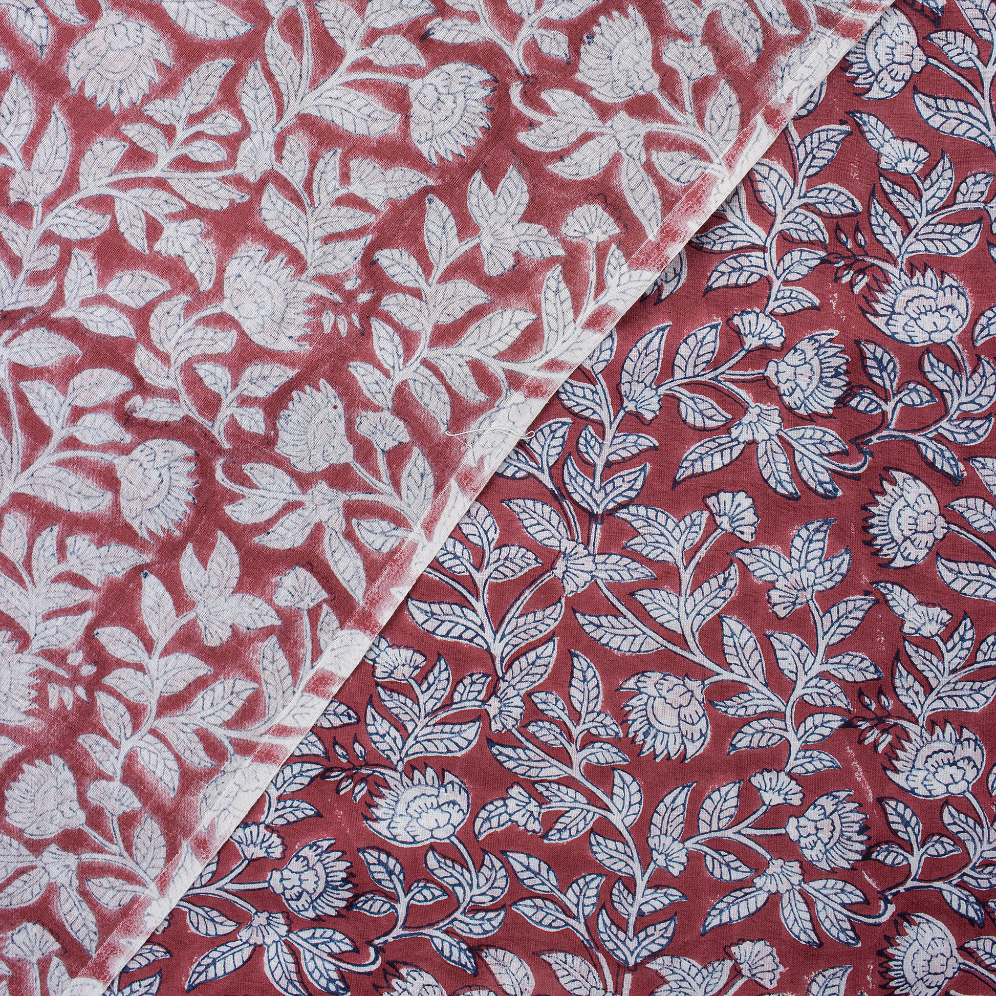 Maroon Floral Self Print Fabric